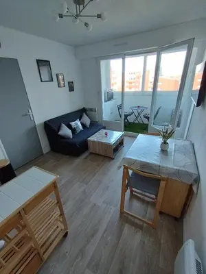 Coin salon dans l'établissement Le charme de Cabourg
