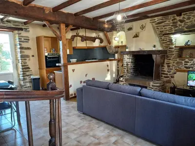 Télévision ou salle de divertissement dans l'établissement Maison au pied du Mont Saint Michel 2