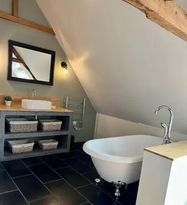 Salle de bains dans l'établissement Le Clos des écureuils