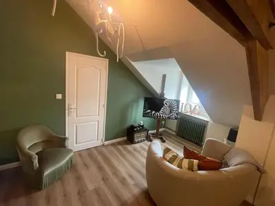 Coin salon dans l'établissement Appartement Cosy et charmant