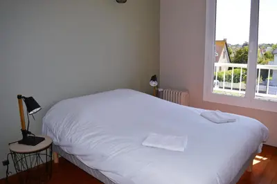 Un ou plusieurs lits dans un hébergement de l'établissement L'Estran - maison sur la digue avec vue mer