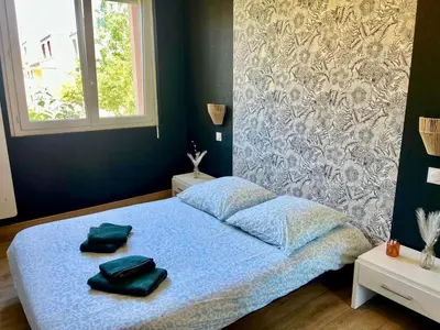 Un ou plusieurs lits dans un hébergement de l'établissement En sol'eau -Appartement à 50 m de la plage