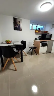 Cuisine ou kitchenette dans l'établissement Appart 2 chambres avec extérieur