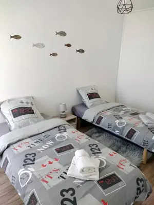 Un ou plusieurs lits dans un hébergement de l'établissement L'appart' du bord de mer 150m de la plage