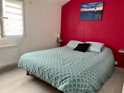 Un ou plusieurs lits dans un hébergement de l'établissement L'Ostréa, maison avec jardin à 200m de la mer-wifi