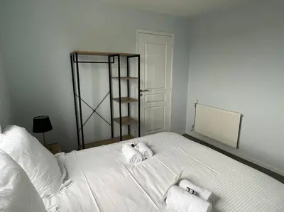 Un ou plusieurs lits dans un hébergement de l'établissement Wasat, Joli appt 3 chambres à Caen