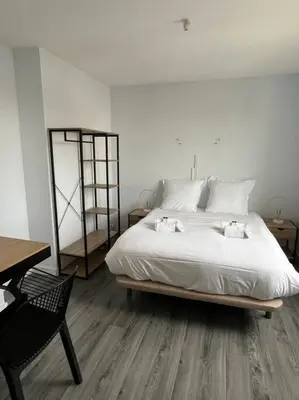Un ou plusieurs lits dans un hébergement de l'établissement Wasat, Joli appt 3 chambres à Caen