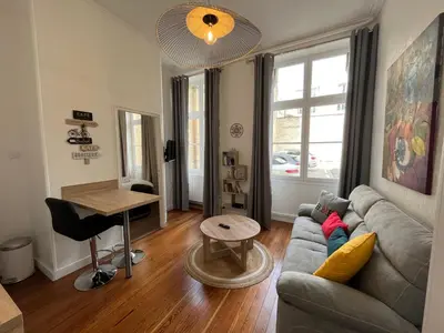 Coin salon dans l'établissement Paon, Coquet appt avec parking à Caen