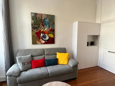 Coin salon dans l'établissement Paon, Coquet appt avec parking à Caen