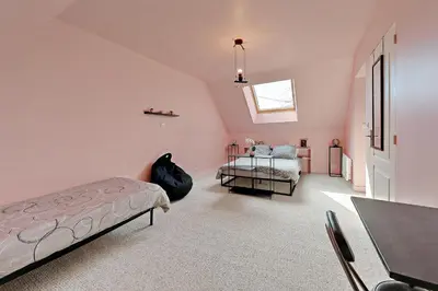 Un ou plusieurs lits dans un hébergement de l'établissement La Coquelière - Belle maison pour 5