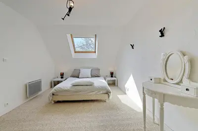 Un ou plusieurs lits dans un hébergement de l'établissement La Coquelière - Belle maison pour 5