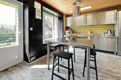 Cuisine ou kitchenette dans l'établissement La Coquelière - Belle maison pour 5