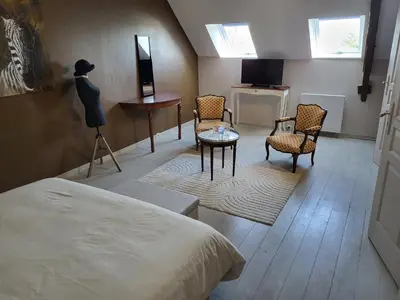 Télévision ou salle de divertissement dans l'établissement La Fée des Greves
