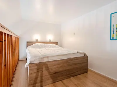 Un ou plusieurs lits dans un hébergement de l'établissement Studio Cabourg Plage-20 by Interhome