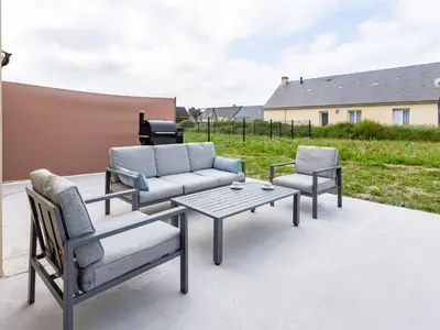 Coin salon dans l'établissement Holiday Home Paradis des Dunes by Interhome