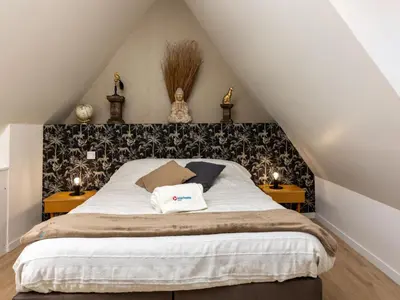 Un ou plusieurs lits dans un hébergement de l'établissement Apartment L'annexe by Interhome