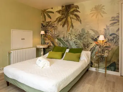 Un ou plusieurs lits dans un hébergement de l'établissement Holiday Home Les Grands Près by Interhome