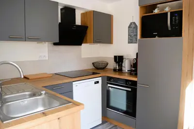 Cuisine ou kitchenette dans l'établissement La Guillaumière - Maison avec bel extérieur