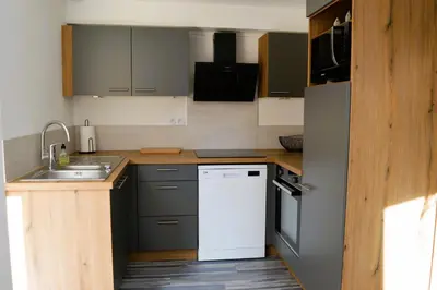 Cuisine ou kitchenette dans l'établissement La Guillaumière - Maison avec bel extérieur