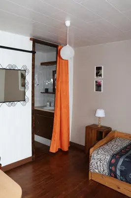 Un ou plusieurs lits dans un hébergement de l'établissement AU DETOUR DU MONT Chambres d'hôtes