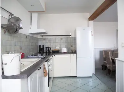 Cuisine ou kitchenette dans l'établissement Gîte Locations des 4 saisons