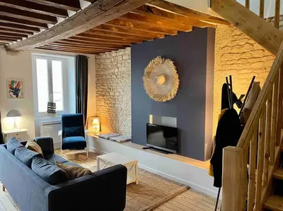 Coin salon dans l'établissement La Petite Baleine, appt à 50m de la plage