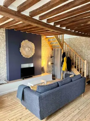 Coin salon dans l'établissement La Petite Baleine, appt à 50m de la plage